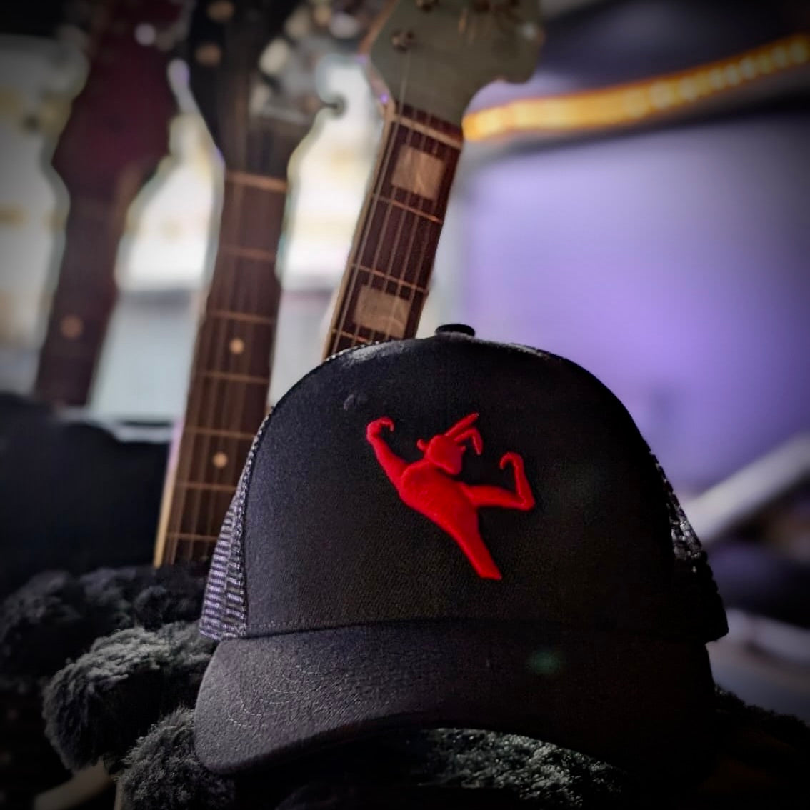 Black Cap with Echo & The Bunnymen Logo in Red.
